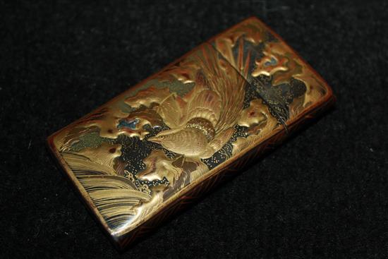 Japanese tortoiseshell card case, gilt-lacquered with crane & bird of paradise among rockwork and branches